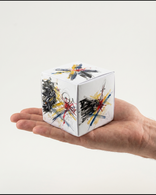 CRASHCUBE collision 4581458 resting on an open palm for scale